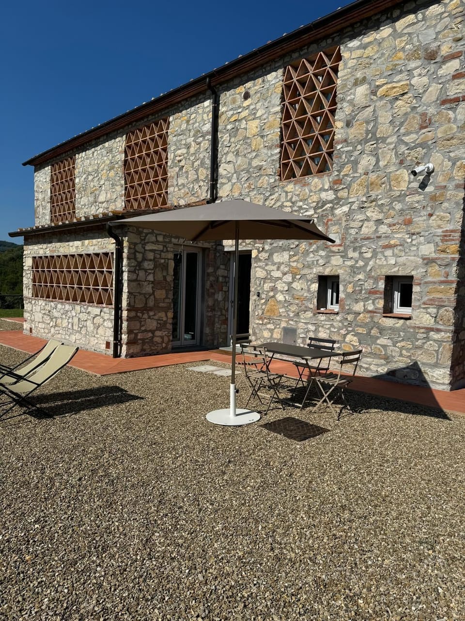Stone villa immersed in the Chianti countryside
