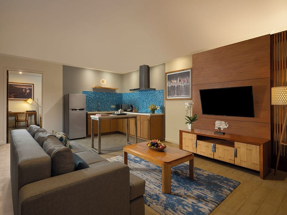 One Bedroom Apartment Suite         | Living area | LED TV, DVD player