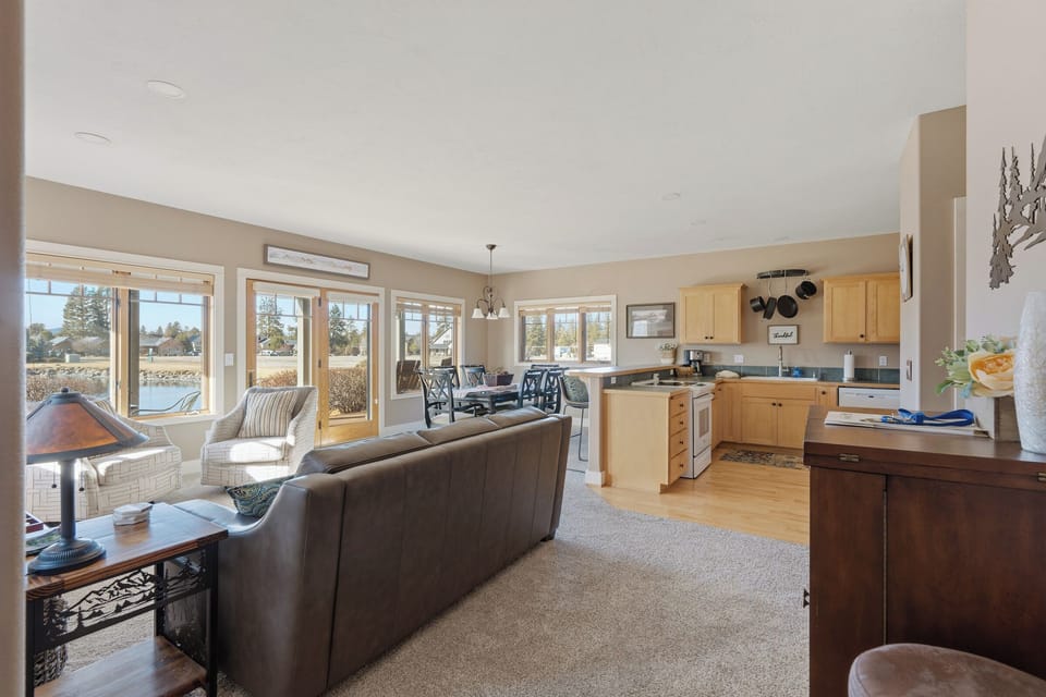 Relax in your spacious open-concept living space where the kitchen flows seamlessly into the comfortable lounge area, perfect for memorable evenings together.
