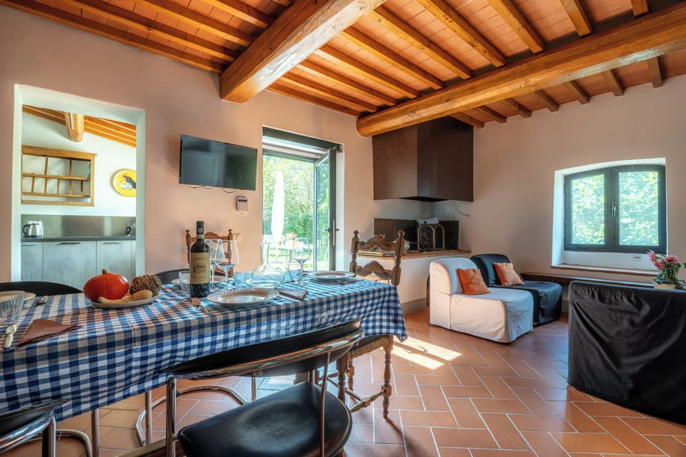 Villa | Living area | 32-inch flat-screen TV with satellite channels, TV