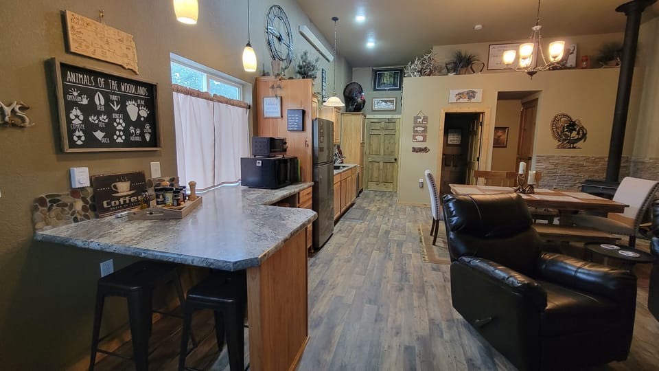 This is a photo showing the closed door at the end is to the bedroom area. 