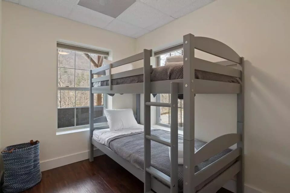 Guest bedroom with twin bed bunk beds.