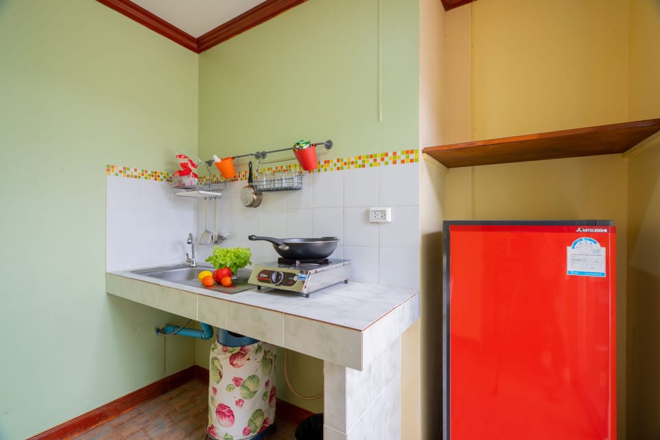 Apartment, 2 Bedrooms | Private kitchen | Fridge, stovetop, coffee/tea maker, electric kettle