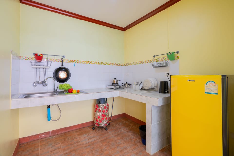 Apartment, 1 Bedroom | Private kitchen | Fridge, stovetop, coffee/tea maker, electric kettle