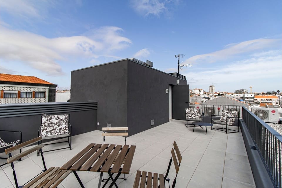 With comfortable chairs perfectly positioned for relaxation, our terrace is the ideal spot to witness breathtaking sunsets and enjoy drinks while taking in the vibrant cityscape. #wonderful #airbnbporto