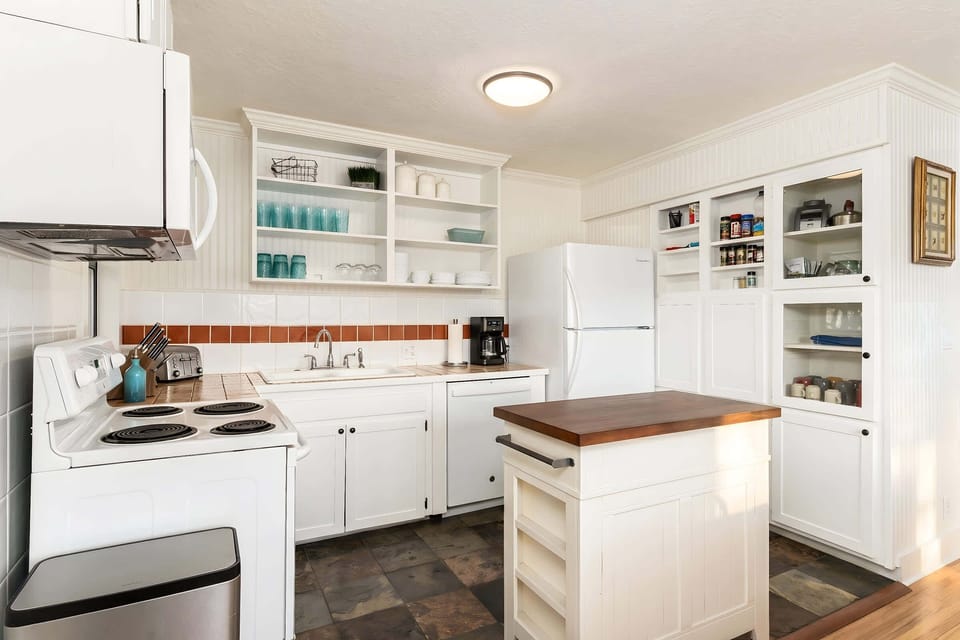 A classic cottage kitchen that's been updated and fully stocked for any meal.