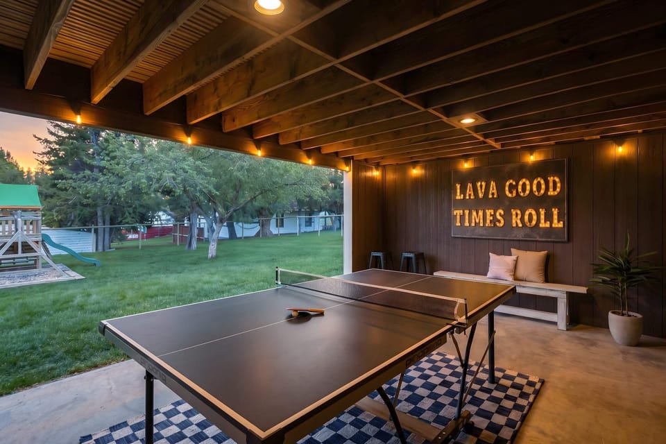 Play on the (professional grade) ping pong table while kids play in the yard. 