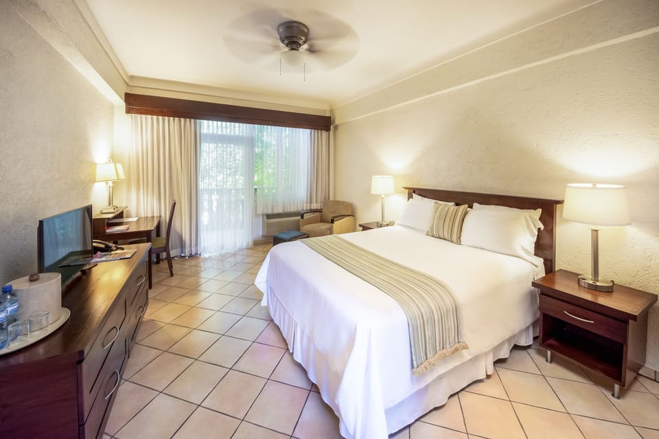 Standard Room | 1 bedroom, in-room safe, desk, laptop workspace