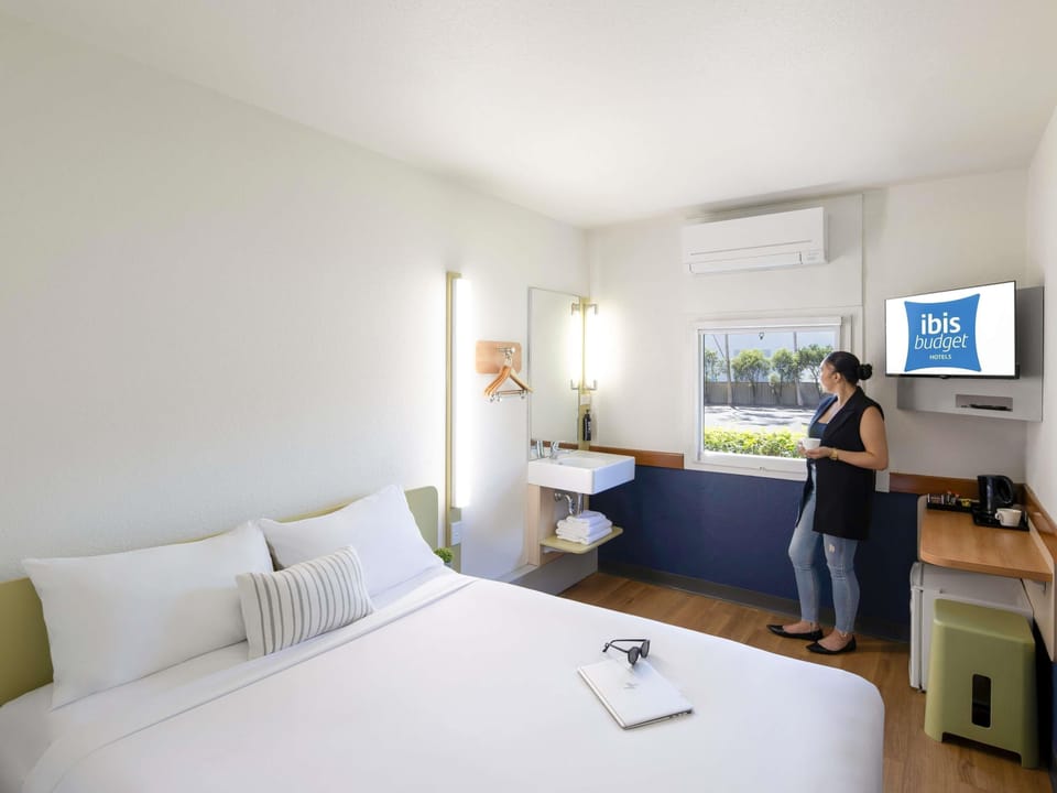 Desk, laptop workspace, free WiFi, bed sheets