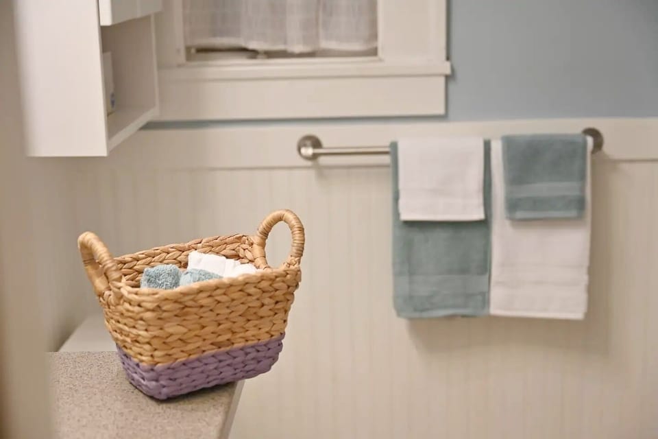 Bathroom in the second floor with hand towels
