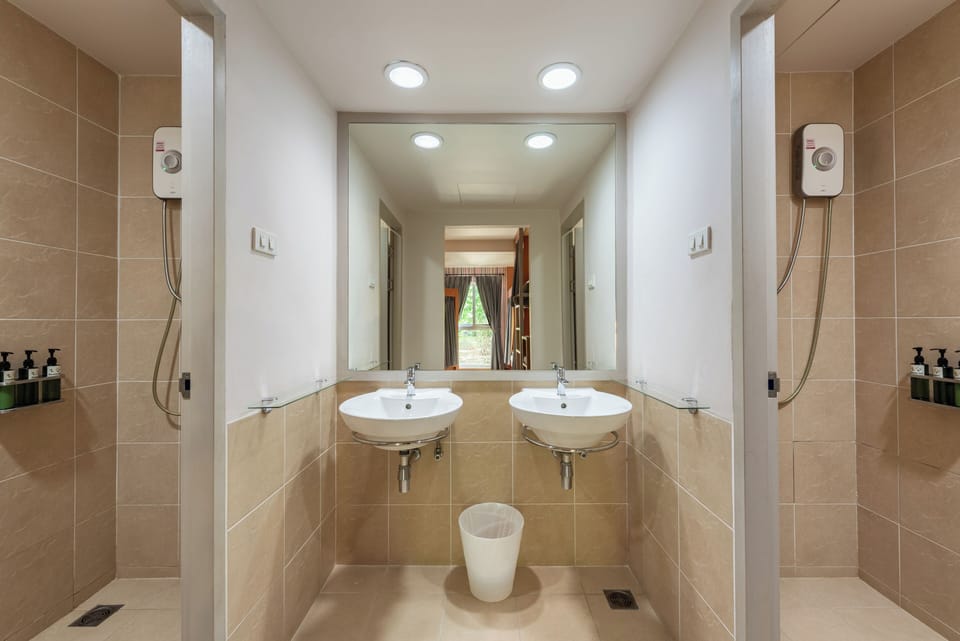 Family Room | Minibar, blackout drapes, free WiFi, bed sheets