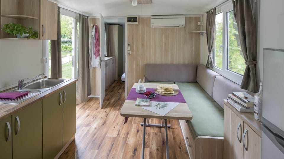 Mobile Home (Family Plus) | Private kitchen | Full-size fridge, stovetop, highchair, cookware/dishes/utensils