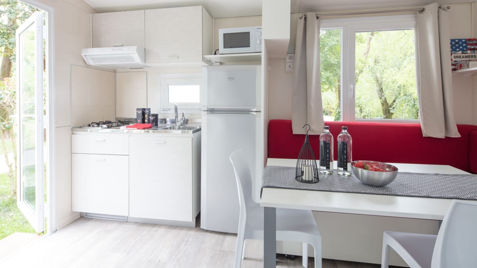 Comfort Mobile Home, 1 Bedroom | Private kitchen | Full-size fridge, stovetop, highchair, cookware/dishes/utensils