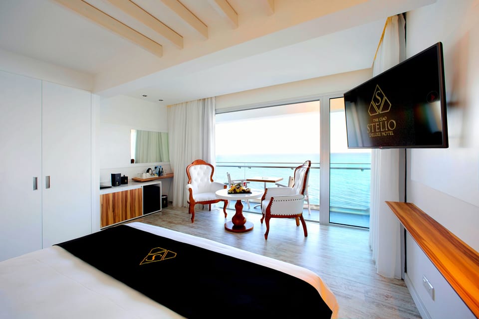 Deluxe Double Room, Balcony, Sea View | Premium bedding, minibar, in-room safe, desk