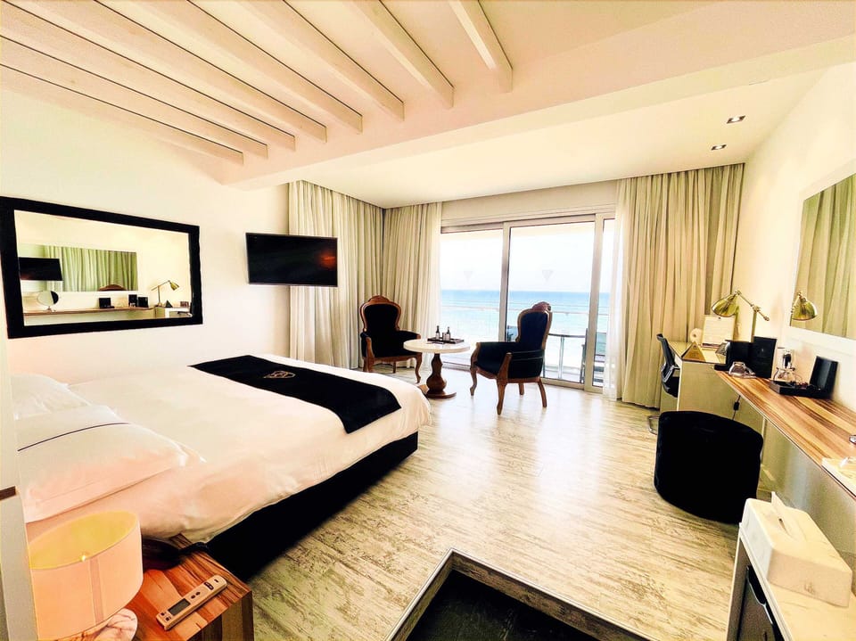 Deluxe Double Room, Balcony, Sea View | Premium bedding, minibar, in-room safe, desk