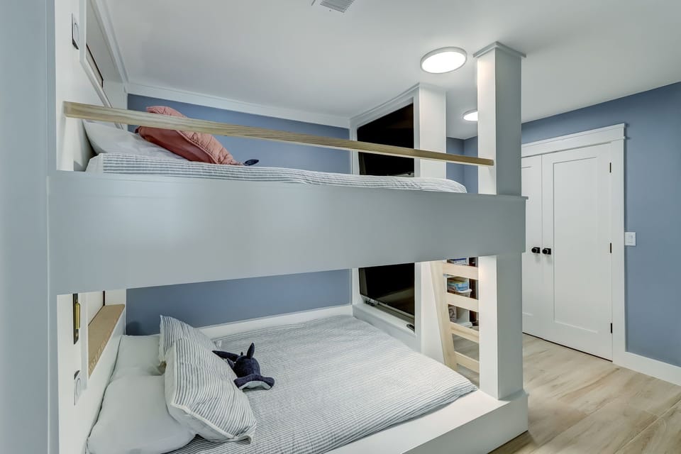Main Level Bedroom 3 with Built In Queen Bunks Each with Flat Screen Smart TV