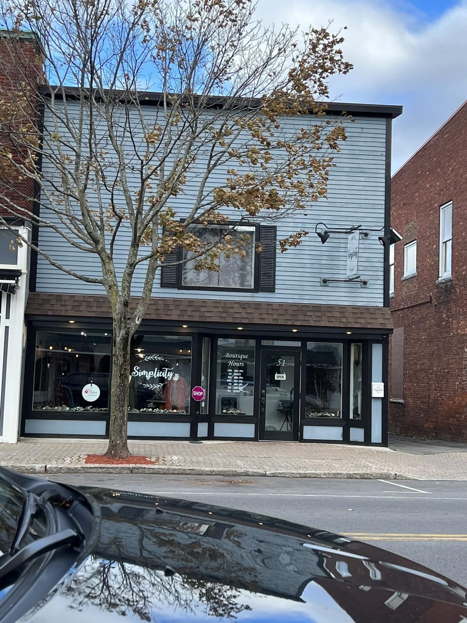 Access is through the boutique front door.