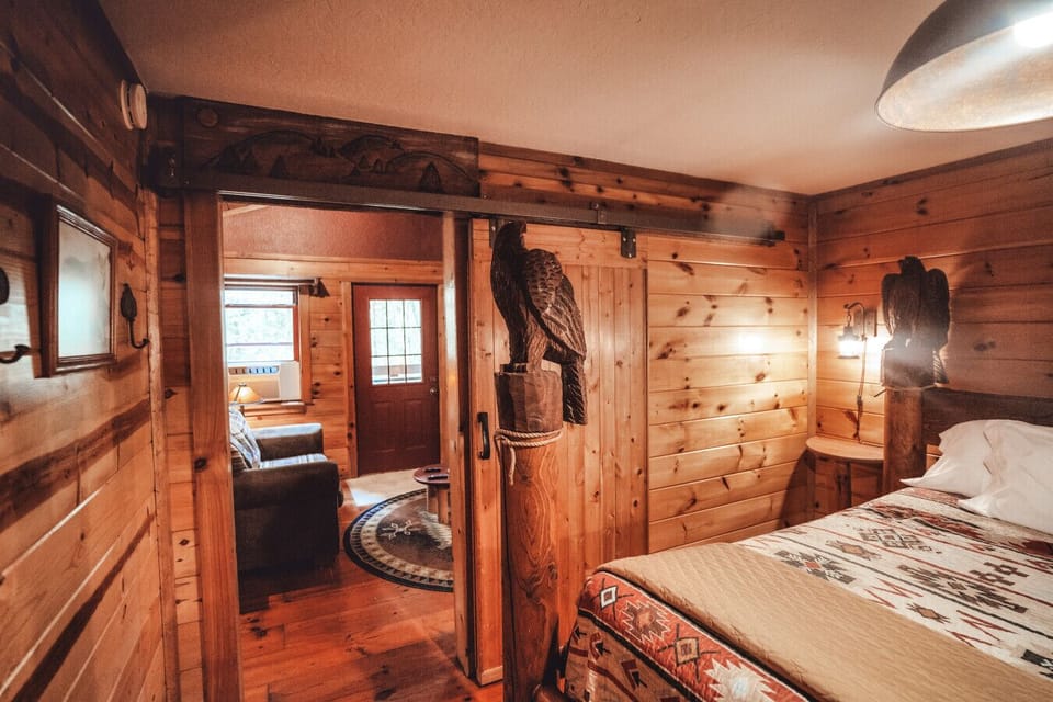 Warm wood bedroom with handcrafted details creates an intimate space for restful nights together