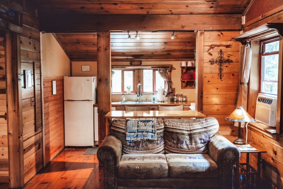 Open cabin layout connects the kitchen and sitting area for easy, relaxed time together