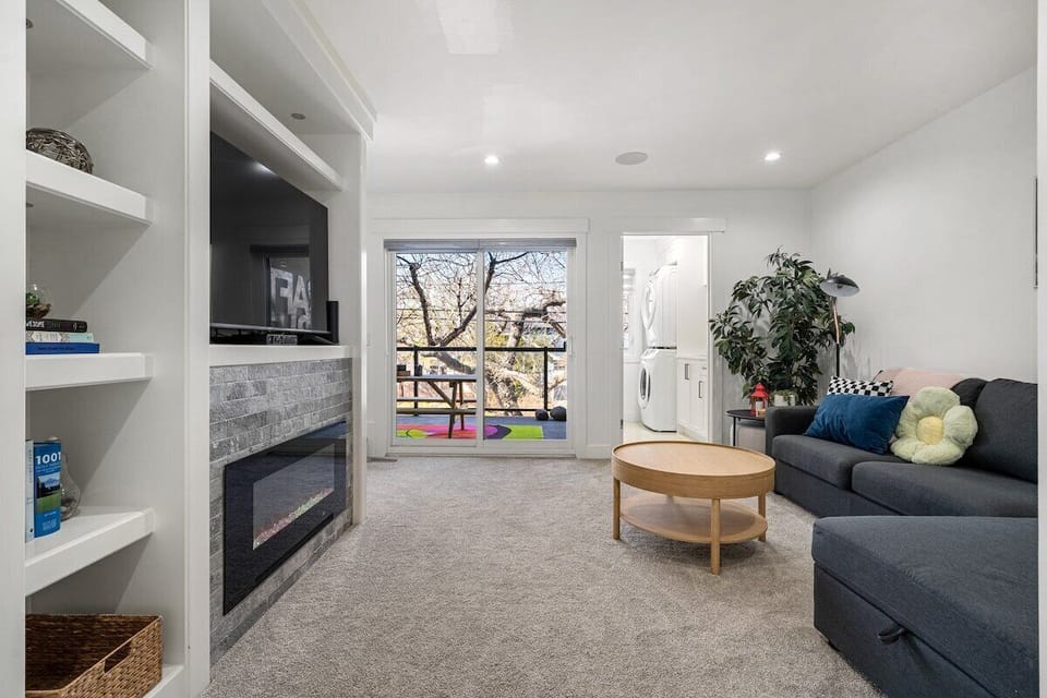 The biggest and coziest living space with a sofabed, TV, fire place and lounging area 
