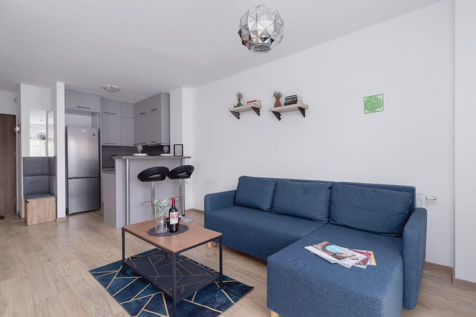 Watch your favorite shows on the flat-screen television in the elegant living area.