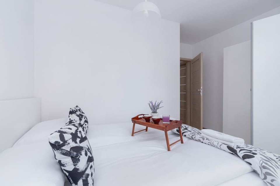 A large window in the bedroom allows for plenty of natural light. 