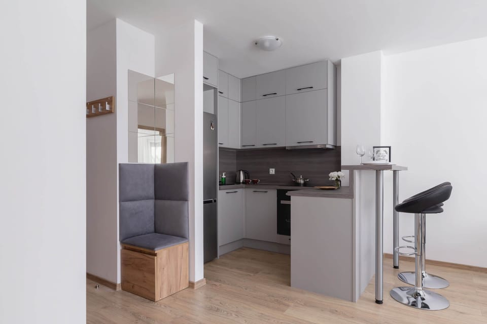 The fully equipped kitchenette includes everything you need for a home-cooked meal.