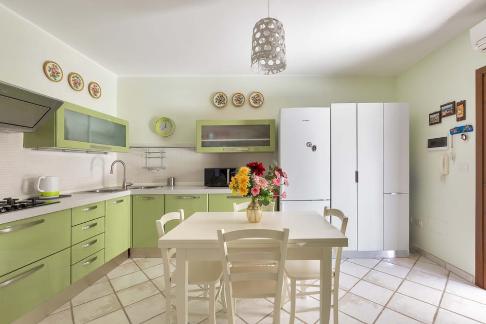 Villa | Private kitchen | Stovetop, dishwasher