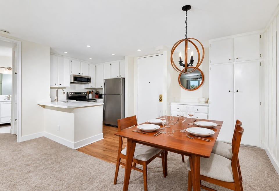 Teak dining set, stainless-steel appliances, and Keurig coffee maker