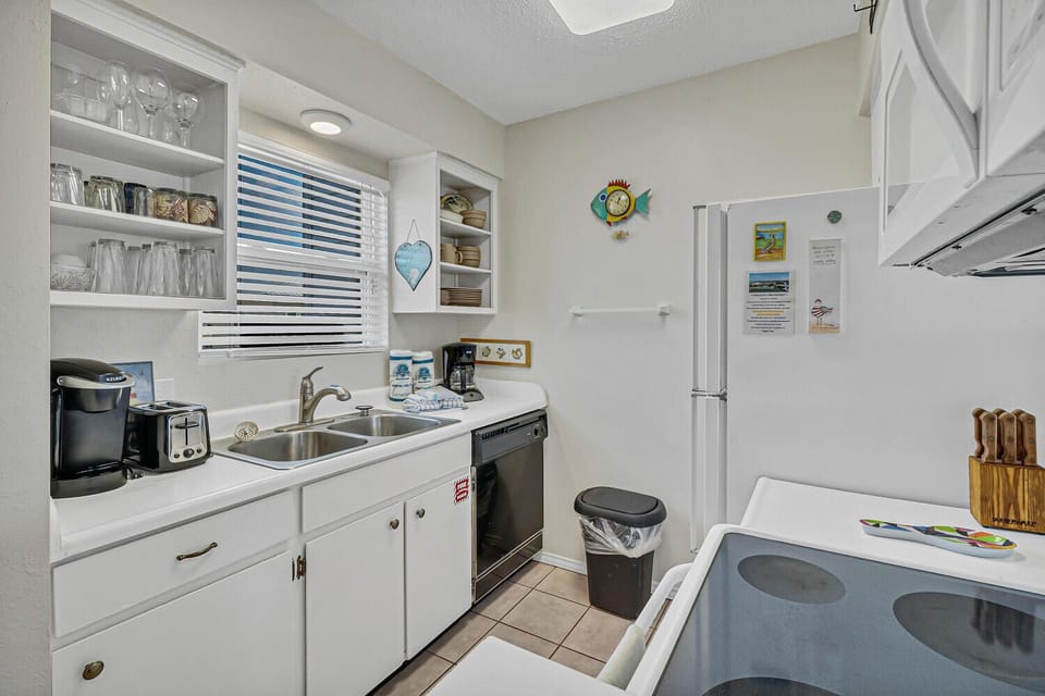 Your fully equipped kitchen awaits with everything needed to create memorable vacation meals together.