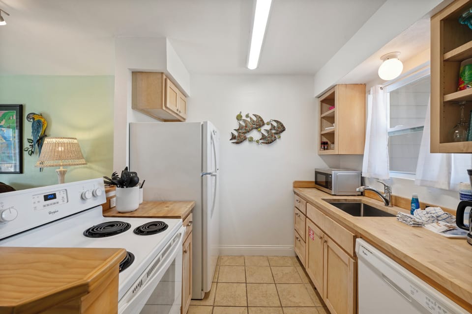 Your fully equipped kitchen awaits with everything needed to create memorable meals during your stay.
