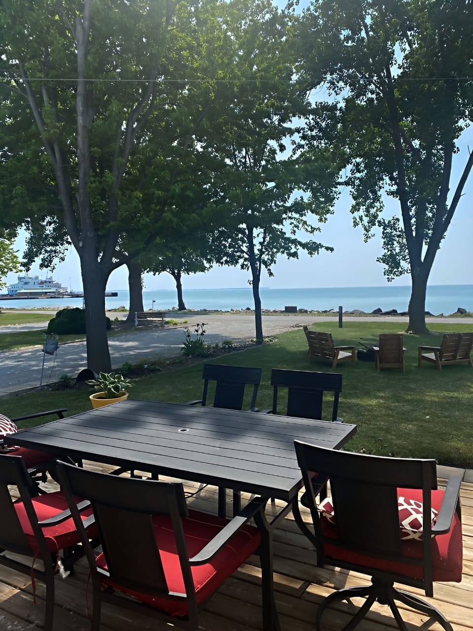 Seats 6 plus extra sling chairs and umbrella on site