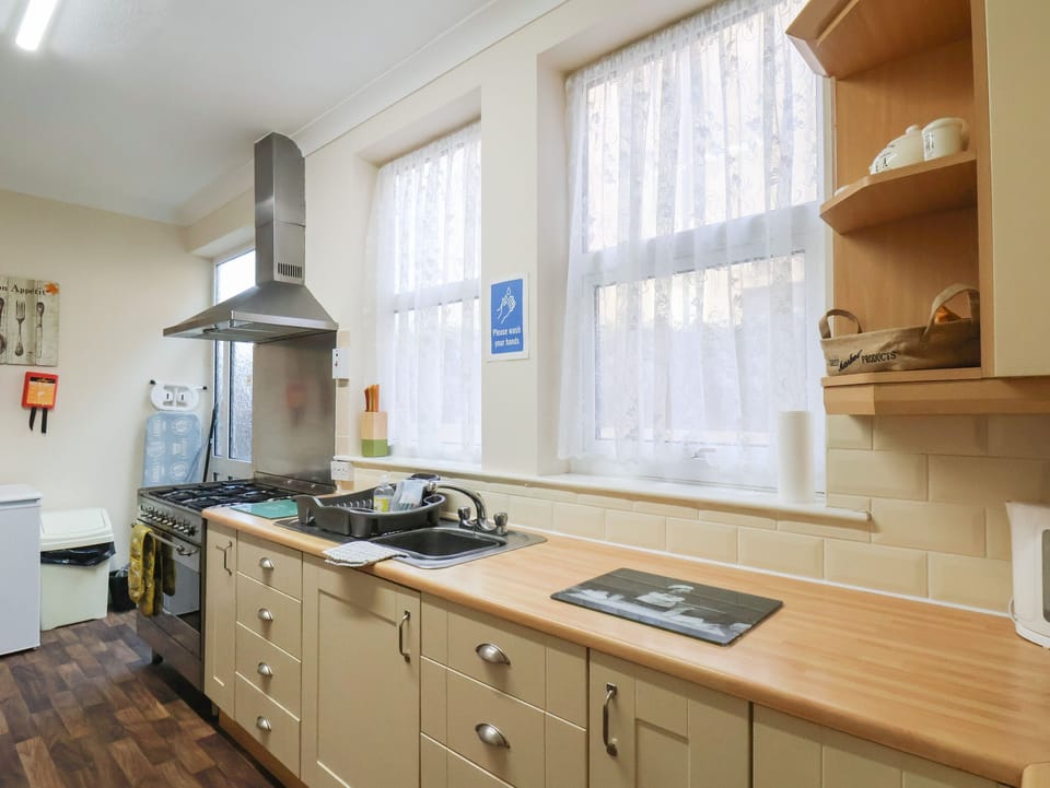 Fridge, electric kettle, toaster, cookware/dishes/utensils