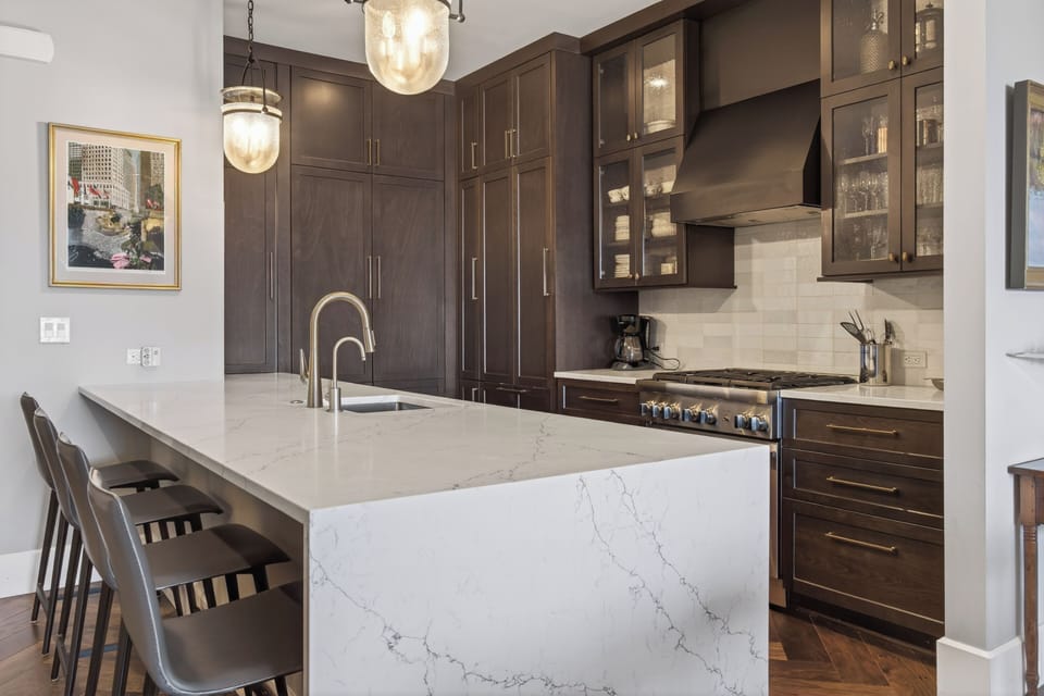 Can you picture morning coffee and breakfast at this waterfall bar top?