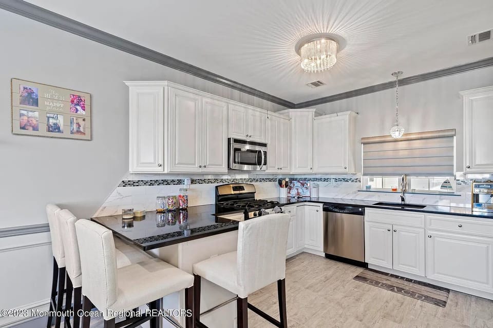 Kitchen located on third floor of condo.
