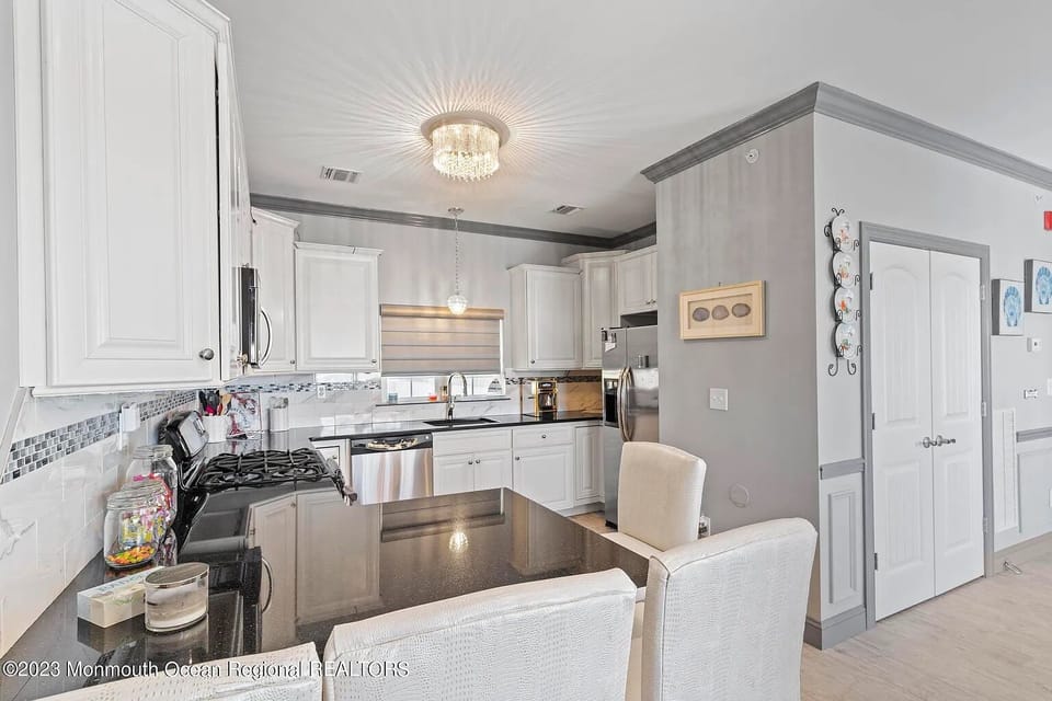 Kitchen located on third floor of condo.