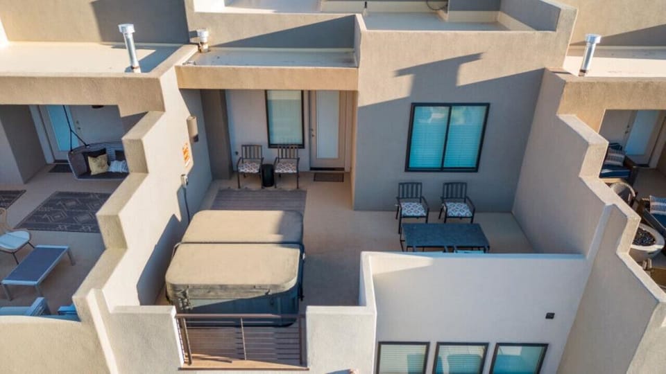 View of back patio with private hot tub