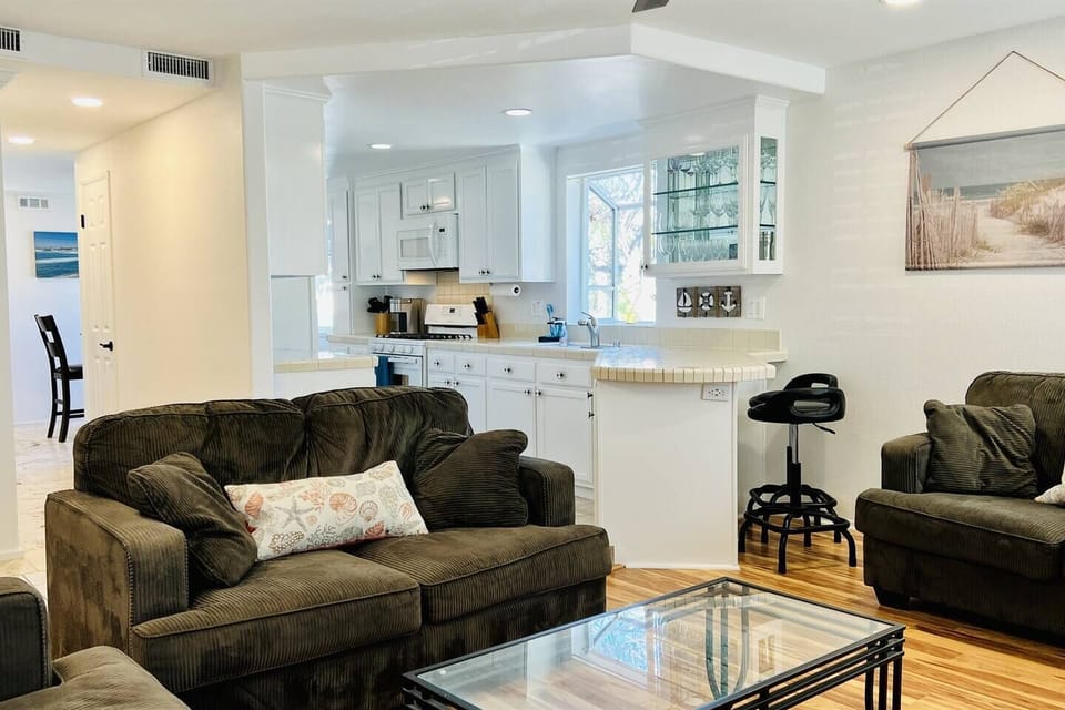 Open concept allows for guest interaction between the living room and the kitchen