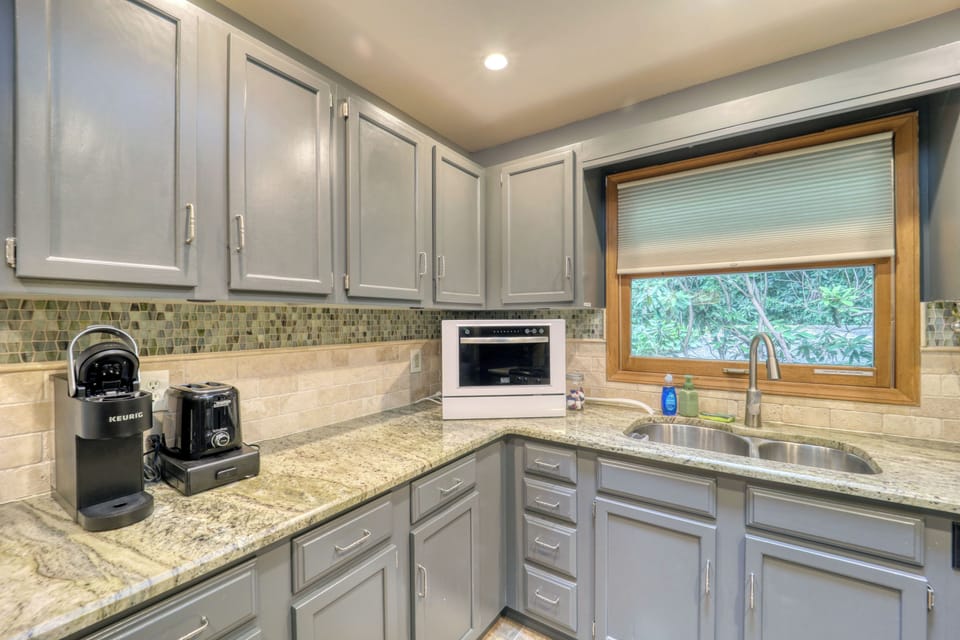 Keurig, toaster, countertop dishwasher and microwave at your disposal