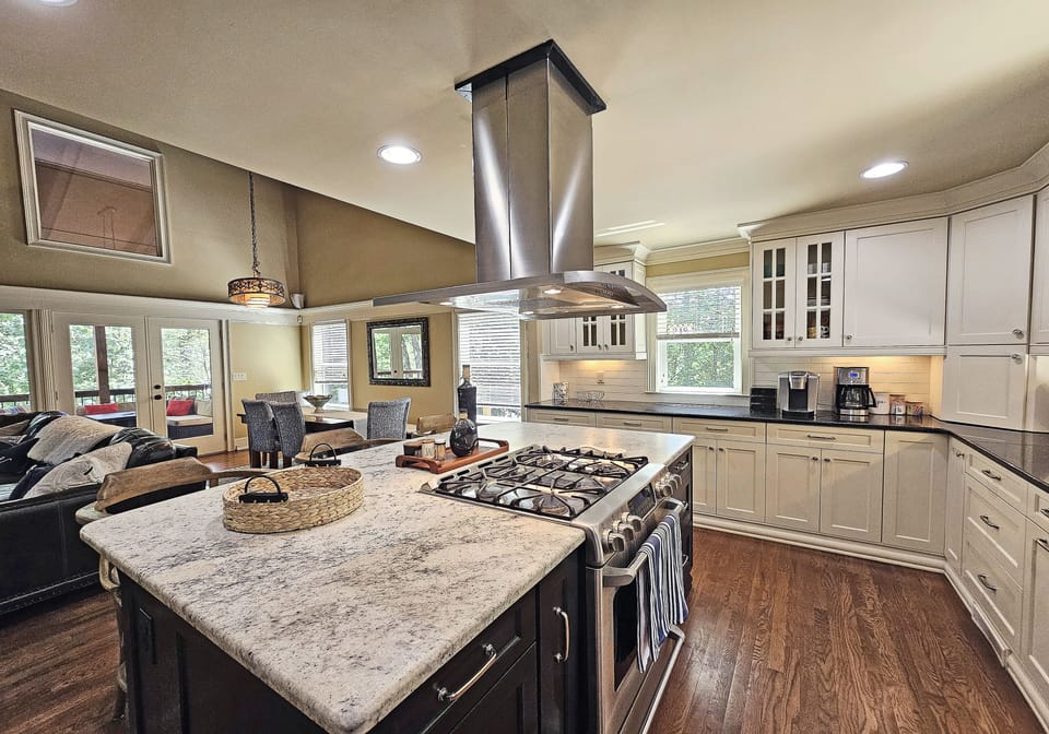 Fully equipped kitchen, granite counter, large gourmet island open to family.