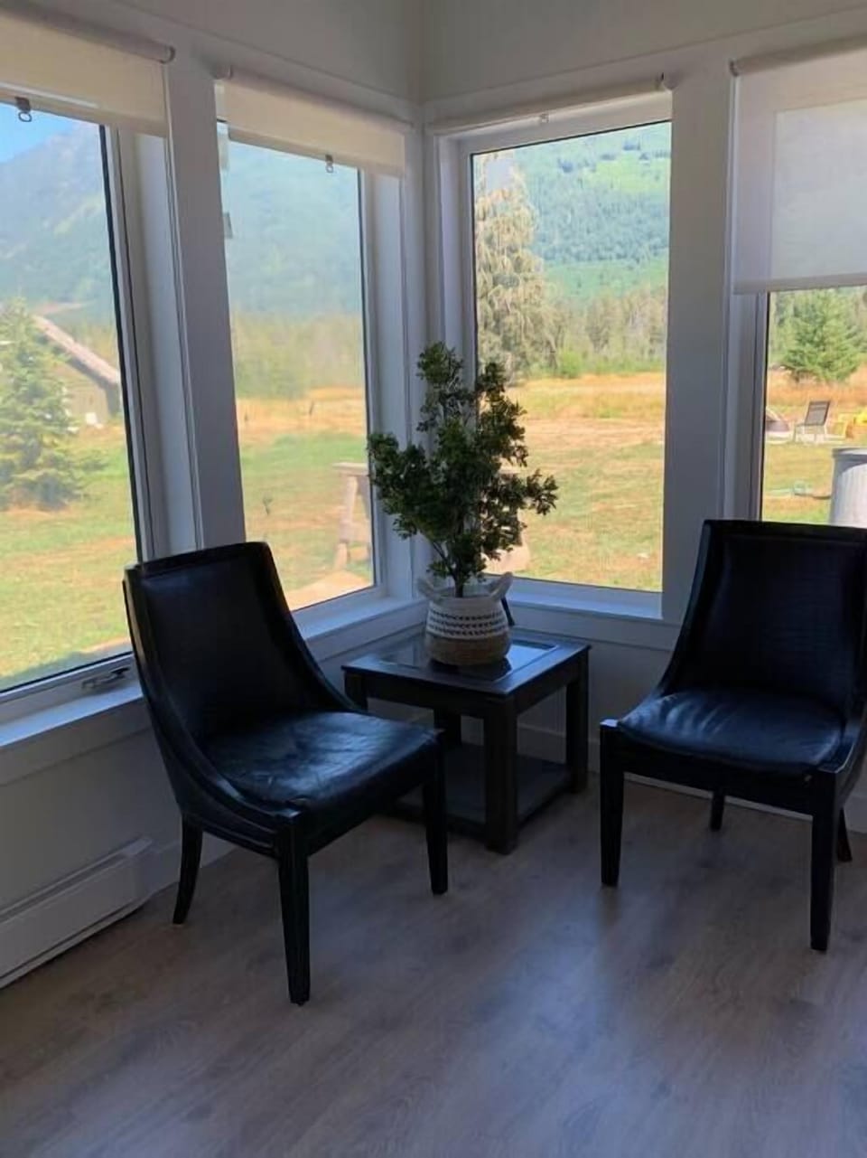 Large master bedroom with gorgeous mountain views of the Beaufort mountains 