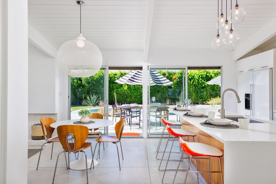 Enjoy the best of both worlds with inviting indoor and outdoor dining spaces for any occasion.