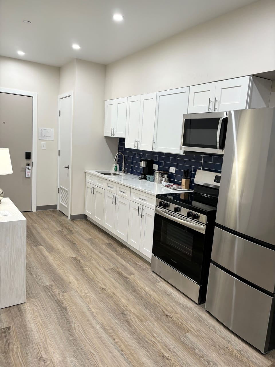 Presidential Suite | Private kitchen | Full-size fridge, microwave, freezer, paper towels
