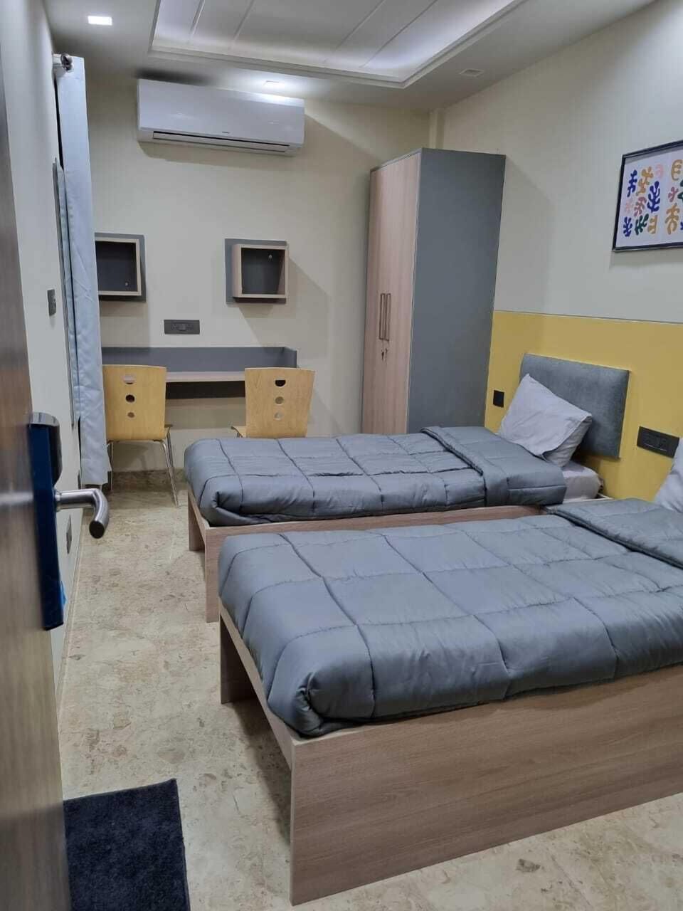 Premium Shared Dormitory, 2 Twin Beds, Non Smoking, City View | Laptop workspace, free WiFi, bed sheets