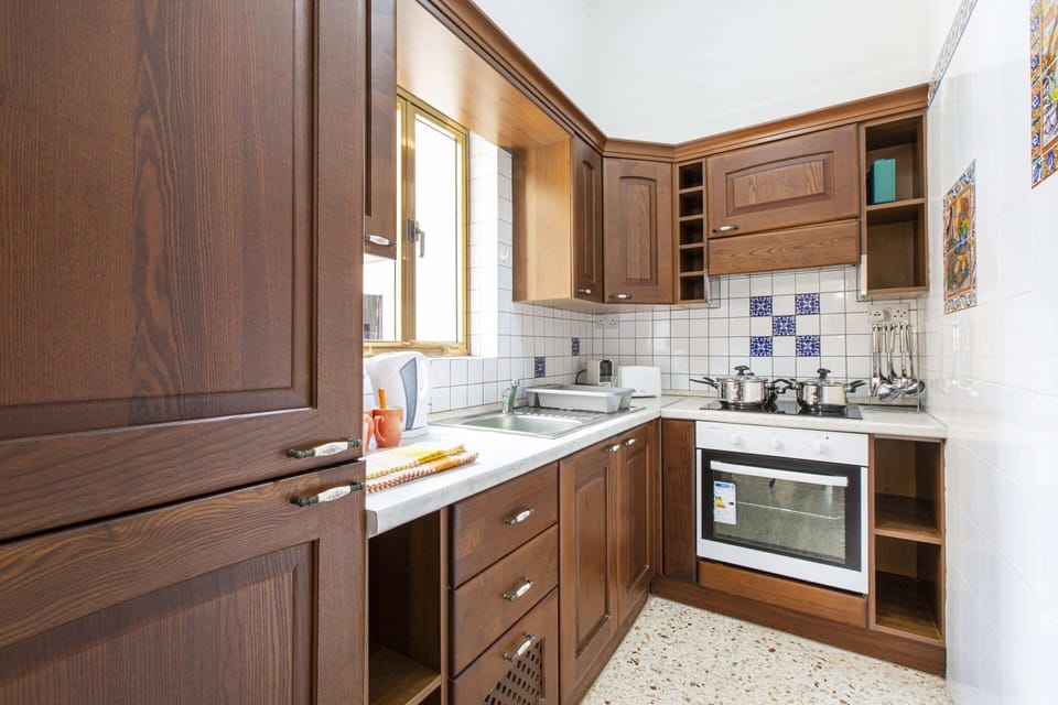 Basic Apartment, Multiple Beds | Private kitchen | Fridge, oven, stovetop, electric kettle
