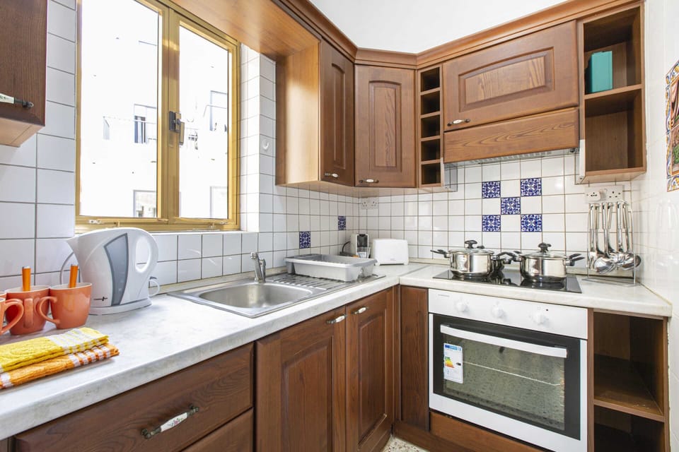Basic Apartment, Multiple Beds | Private kitchen | Fridge, oven, stovetop, electric kettle