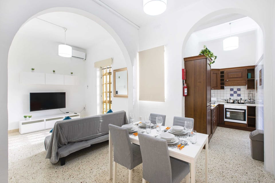 Basic Apartment, Multiple Beds | Living area | TV