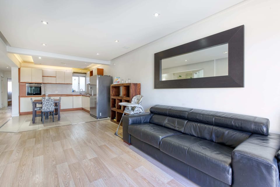 Basic Apartment, Multiple Beds | Living area | TV