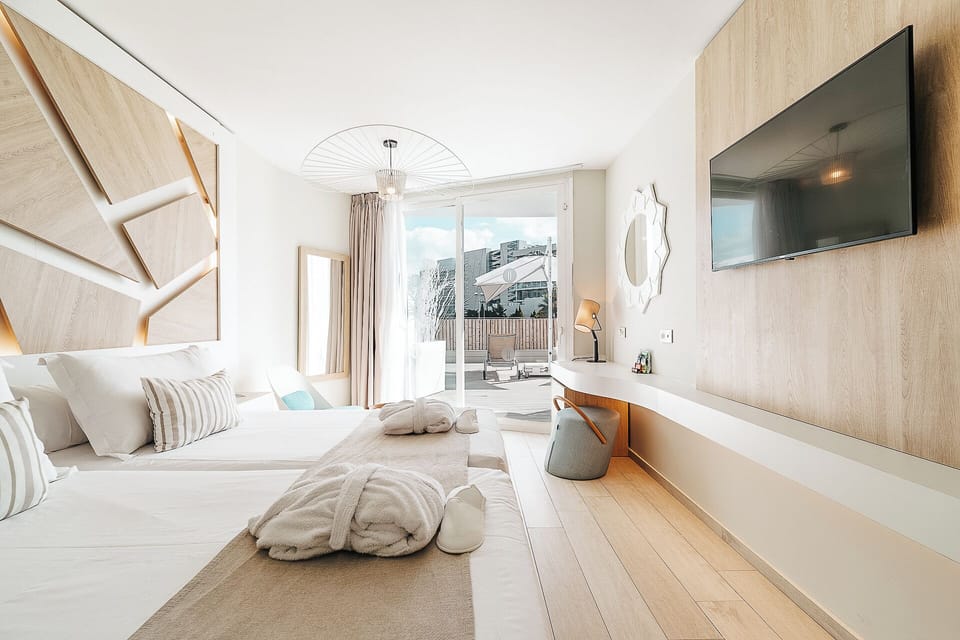 Double Room, Terrace (Embrace Solarium) "Minibar no refill" | Minibar, in-room safe, desk, laptop workspace