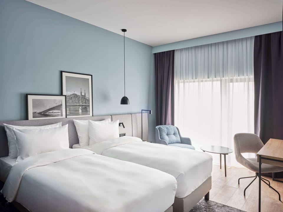 Hypo-allergenic bedding, in-room safe, desk, laptop workspace